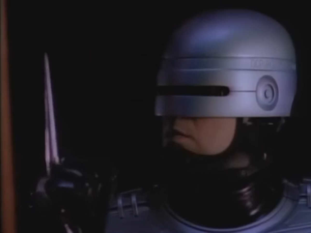 RoboCop, with his totally-nonlethal pointy stick attachment.