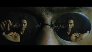 Neo chooses a pill, from the Matrix